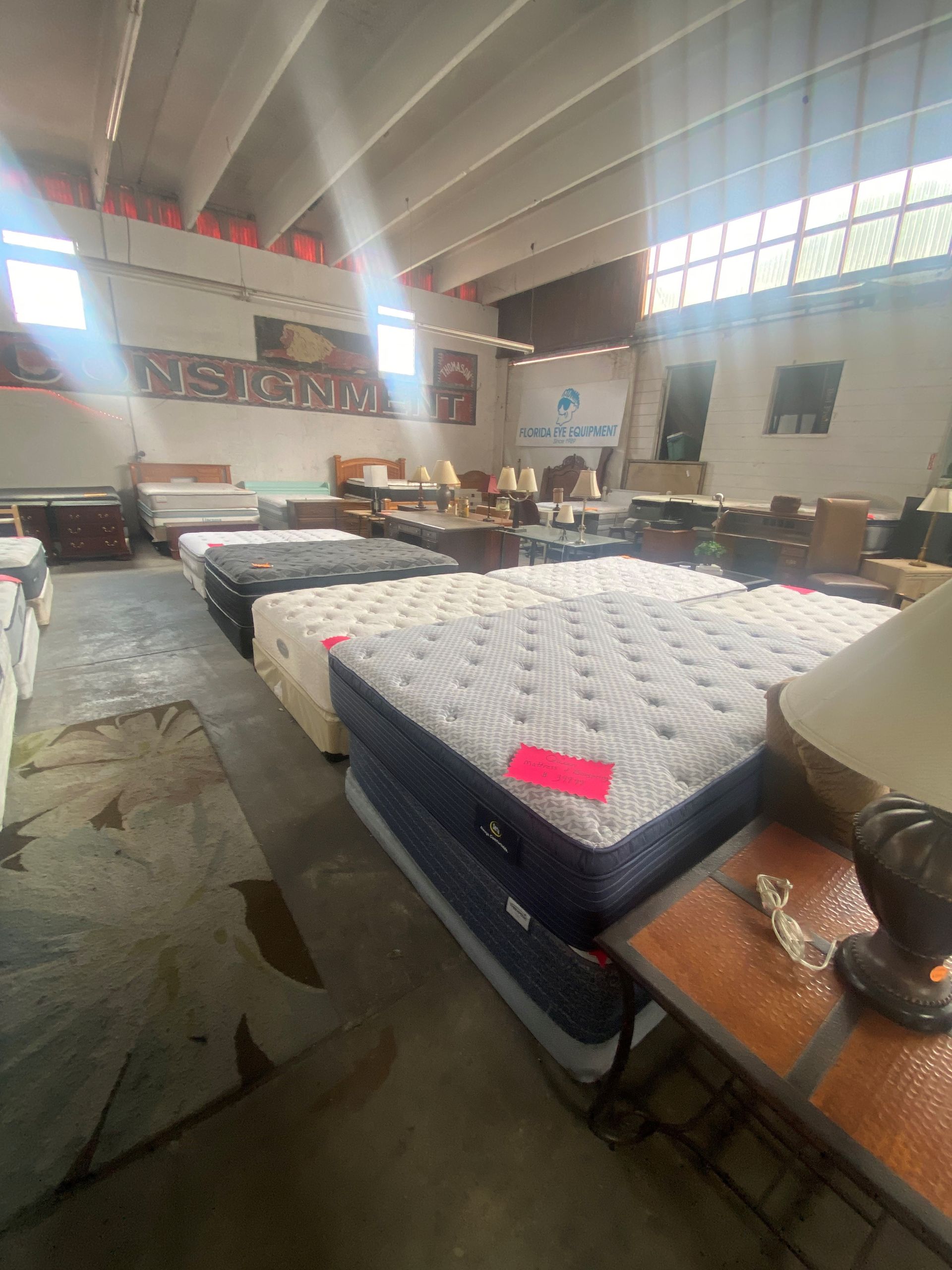 A Close up of a Mattress on a Bed With a Blanket on Top of It — Lakeland, FL — Thomason Furniture & Mattress