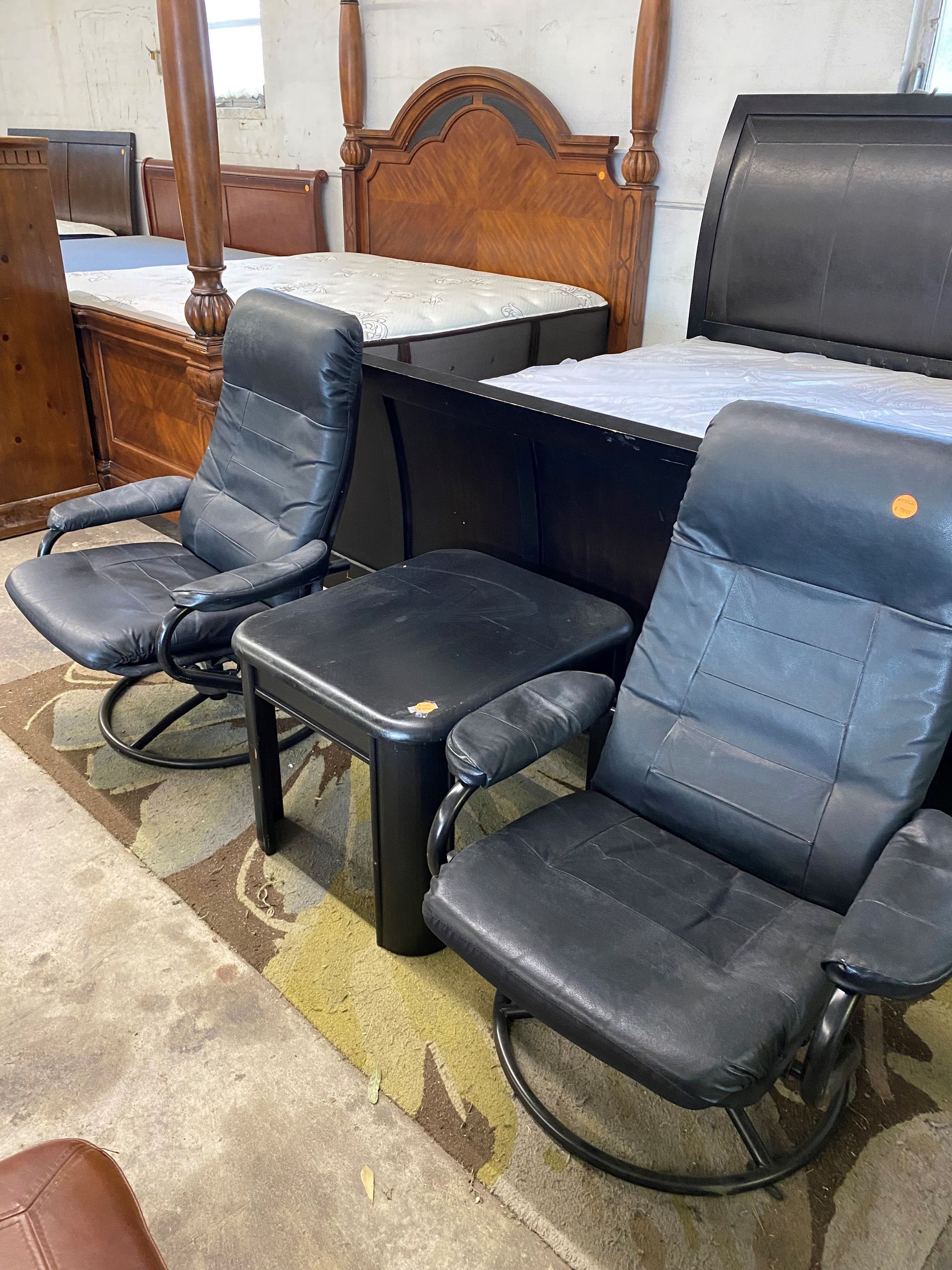 A Home Office With Two Computer Monitors, a Laptop, and a Chair — Lakeland, FL — Thomason Furniture & Mattress