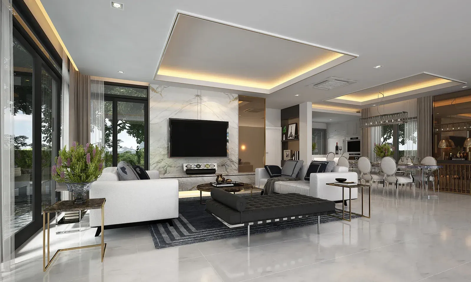 Modern living room with white sofas, large TV, marble accent wall, and recessed lighting.