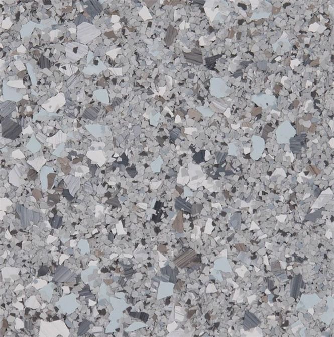 Gray and white speckled terrazzo flooring.