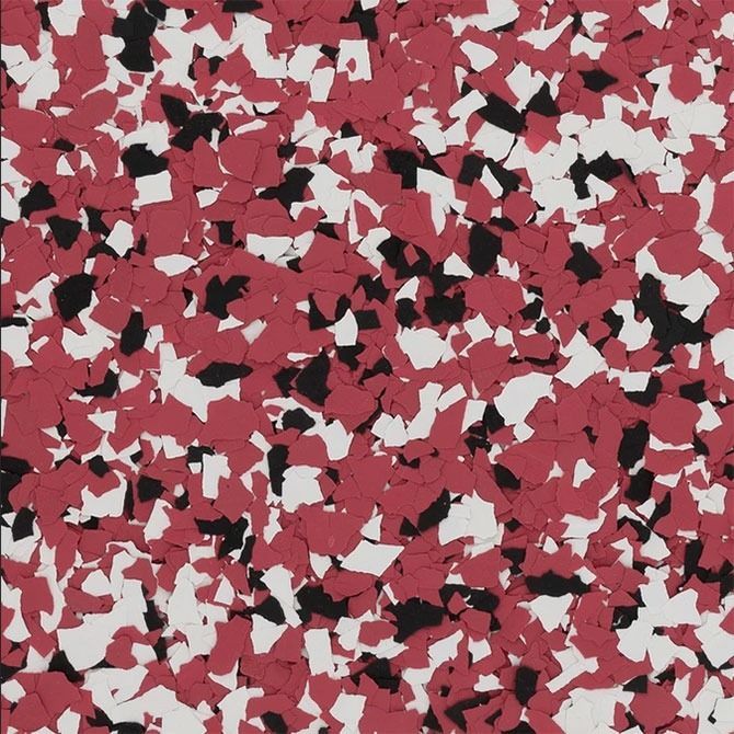 Multi-colored speckled flooring: red, white, and black chips on the surface.