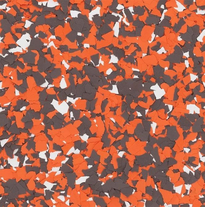 A close up of orange and gray rubber flooring