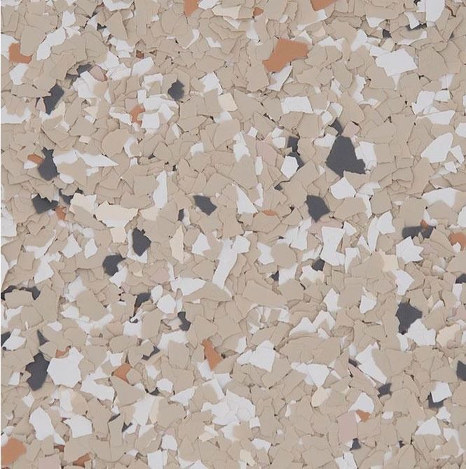 A close up of a brown and white marble floor