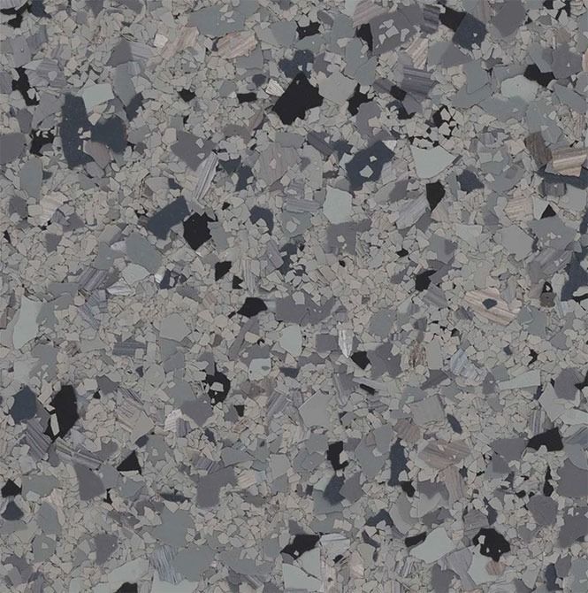 Gray speckled flooring with black, dark gray, and light gray chips.