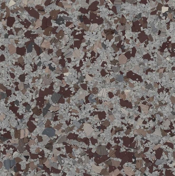 Speckled floor: gray, brown, and beige chips on a darker gray background.