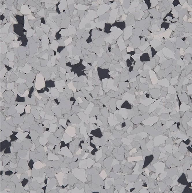 Gray, white, and black speckled epoxy floor.