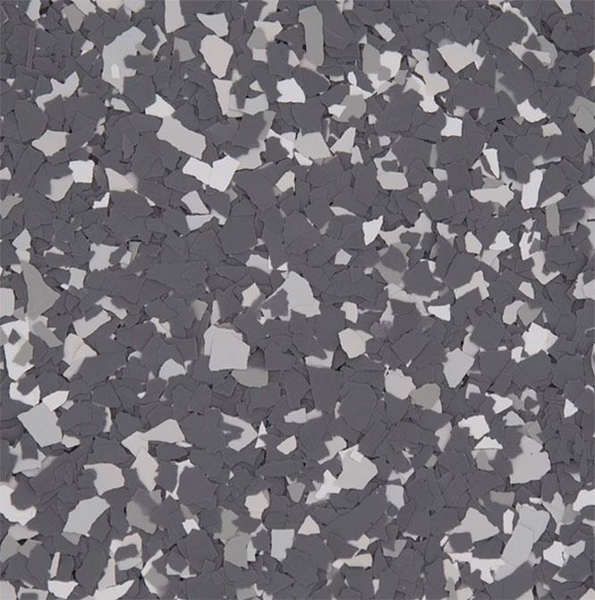 Gray speckled floor with light and dark chips.