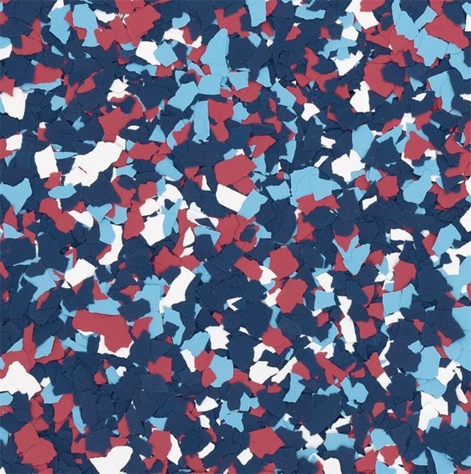Multi-colored speckled pattern: navy, light blue, red, and white flakes.