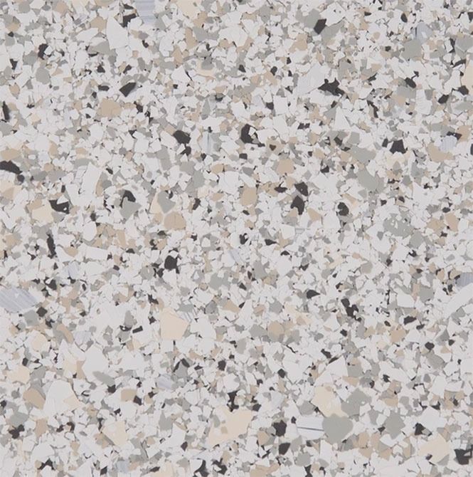 Speckled floor with white, gray, beige, and black chips.