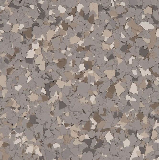 A close up of a gray and white tile floor