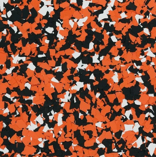 Orange, black, and white flecked epoxy flooring.