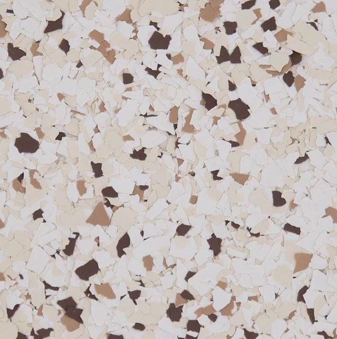 Floor with beige, brown, and white speckled chips.
