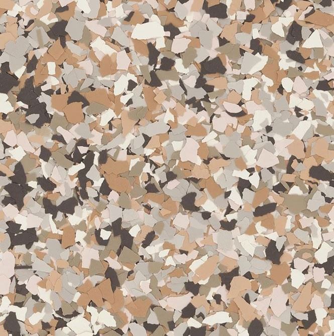 A close up of a camouflage pattern on a wall.