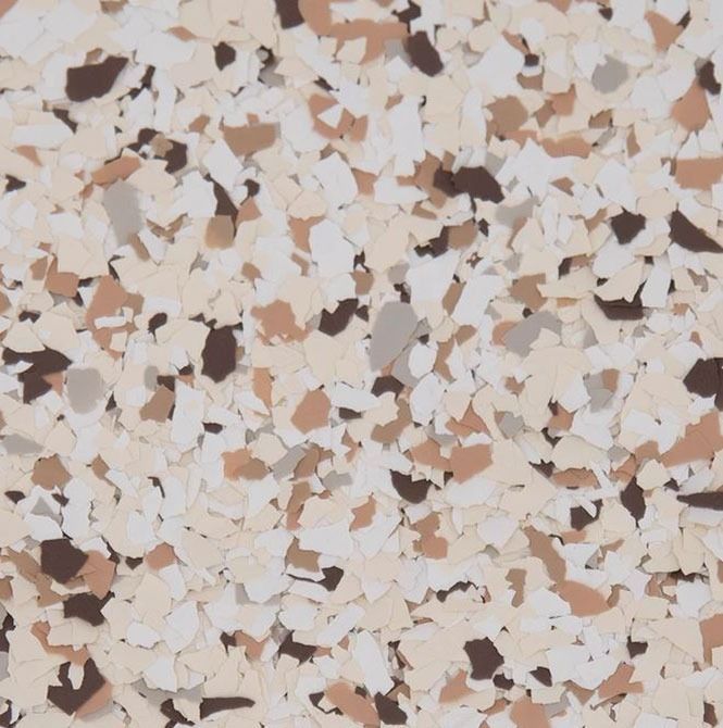 Speckled floor coating with tan, brown, cream, and gray chips.