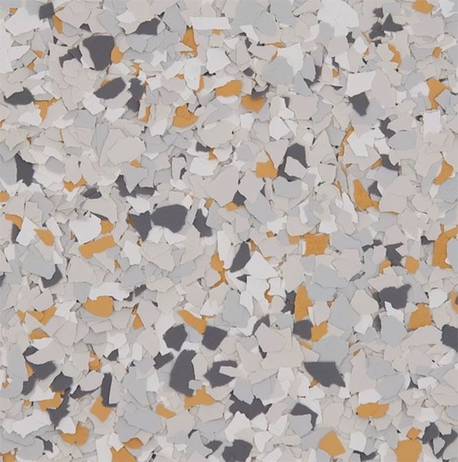 Chips of gray, white, yellow, and black, scattered pattern.