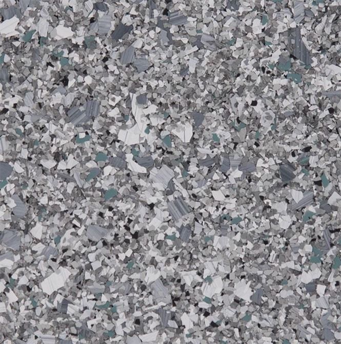 Speckled flooring in shades of gray, white, and teal.