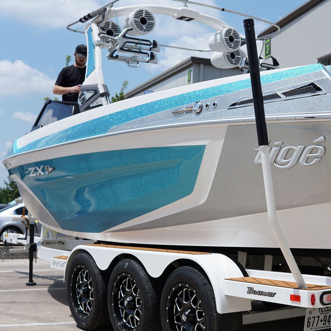 A boat that has the word tige on it