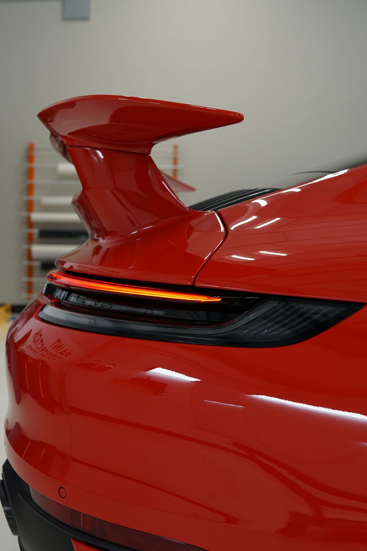 A close up of the hood of a tesla model 3