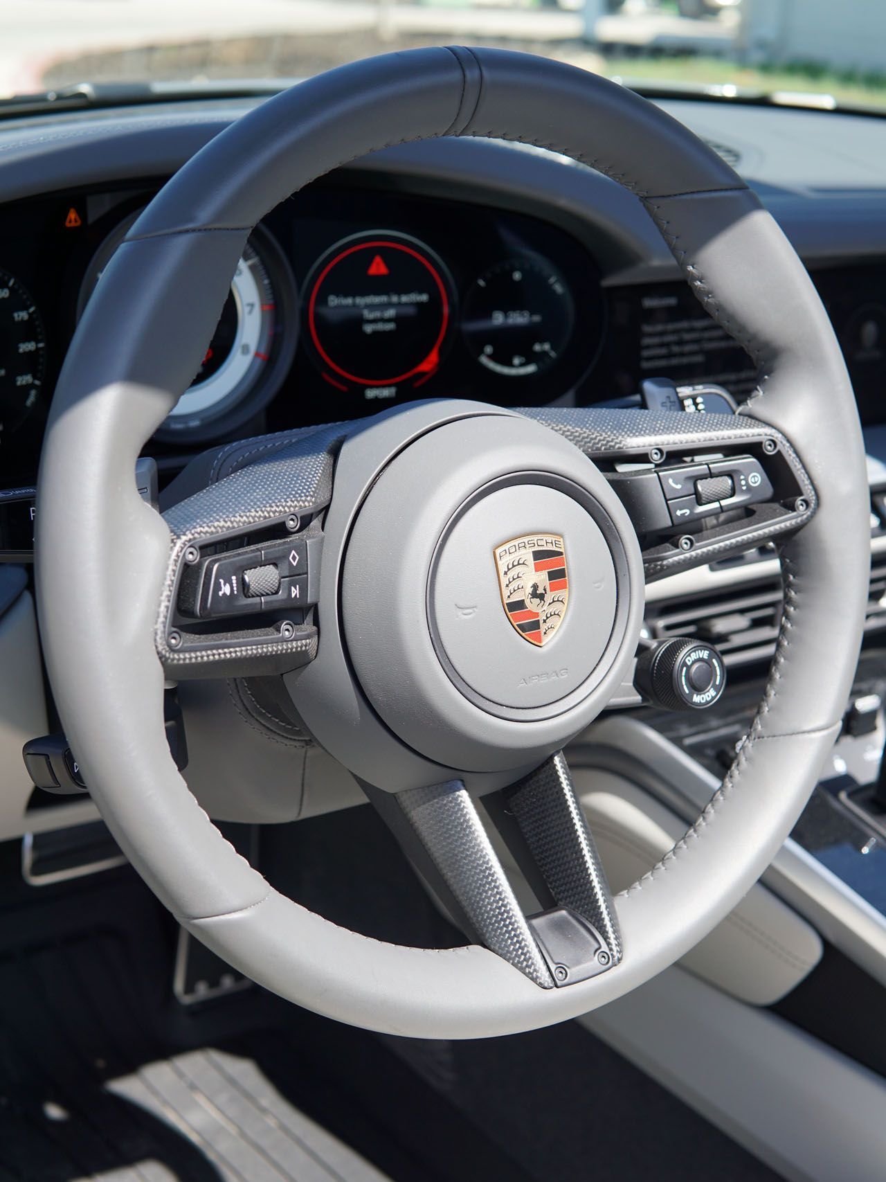 A close up of an audi logo on a wheel