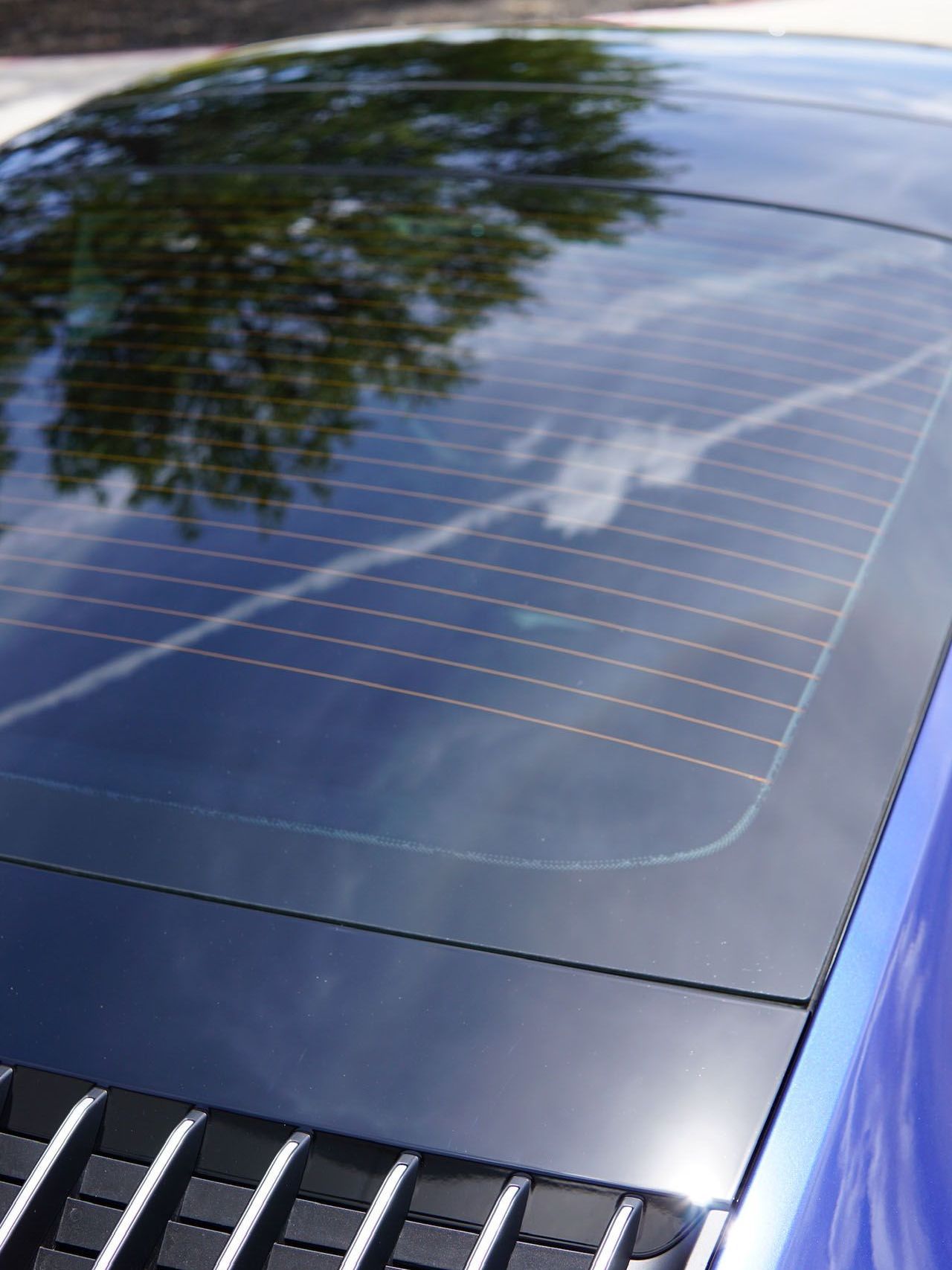 A close up of the roof of a blue car