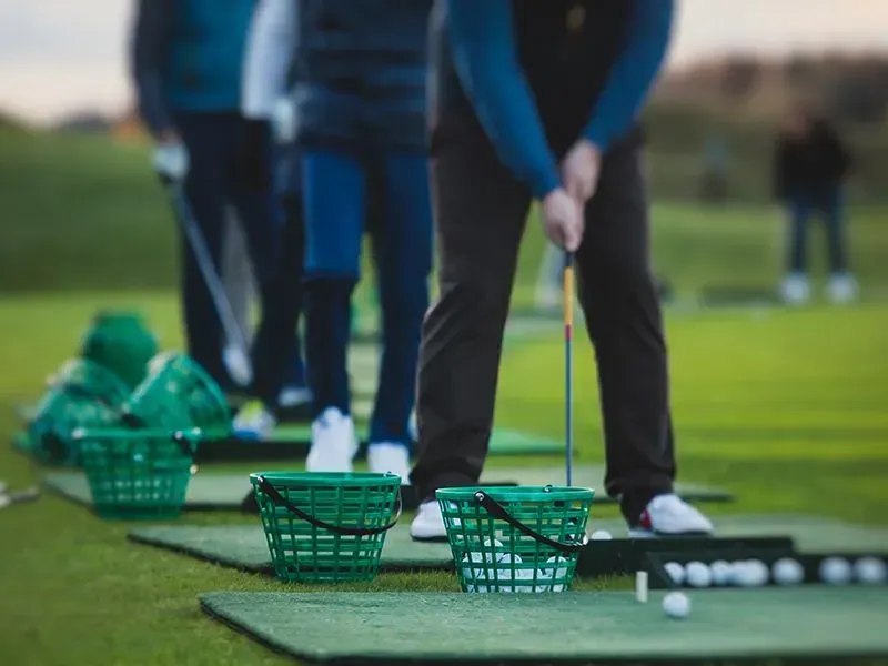 Golfers at the driving range