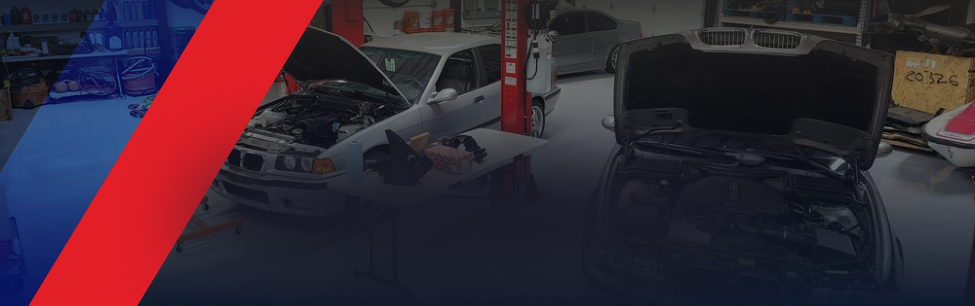 A car is being repaired in a garage with the hood open. | Bavarian Auto Clinic