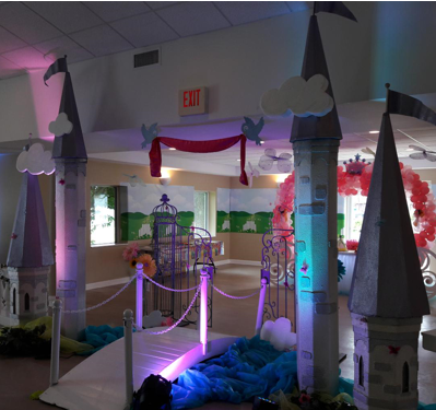 A room with a red exit sign on the wall