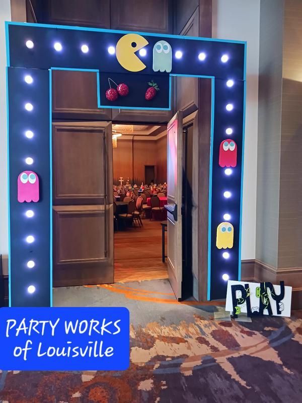 A party works of louisville photo of a pac man archway.