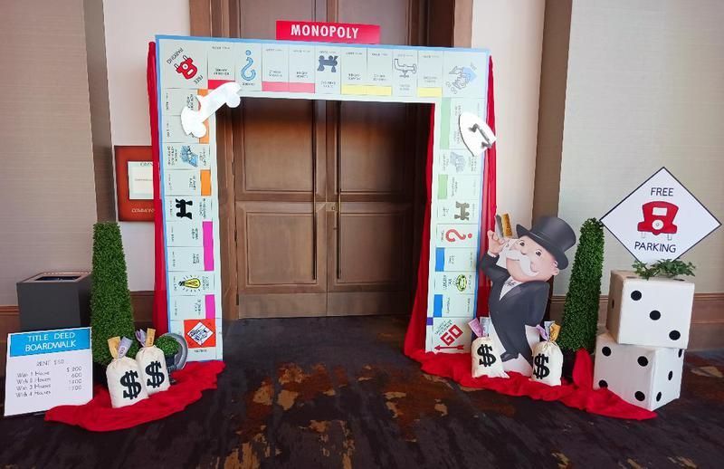 A monopoly game is being displayed in a room