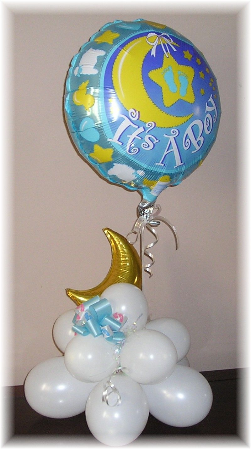 A blue balloon that says ' it 's a boy ' on it