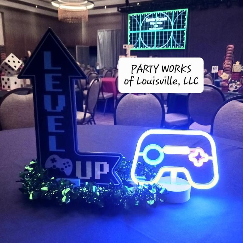 A sign that says level up is on a table