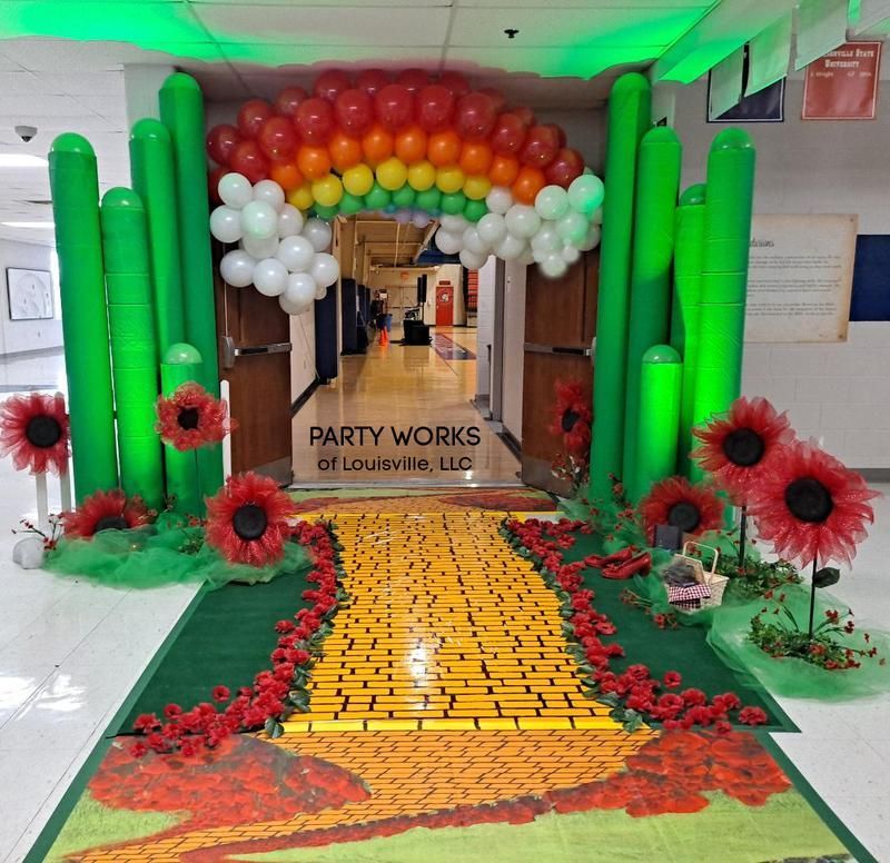 A hallway with a sign that says party works of louisville llc