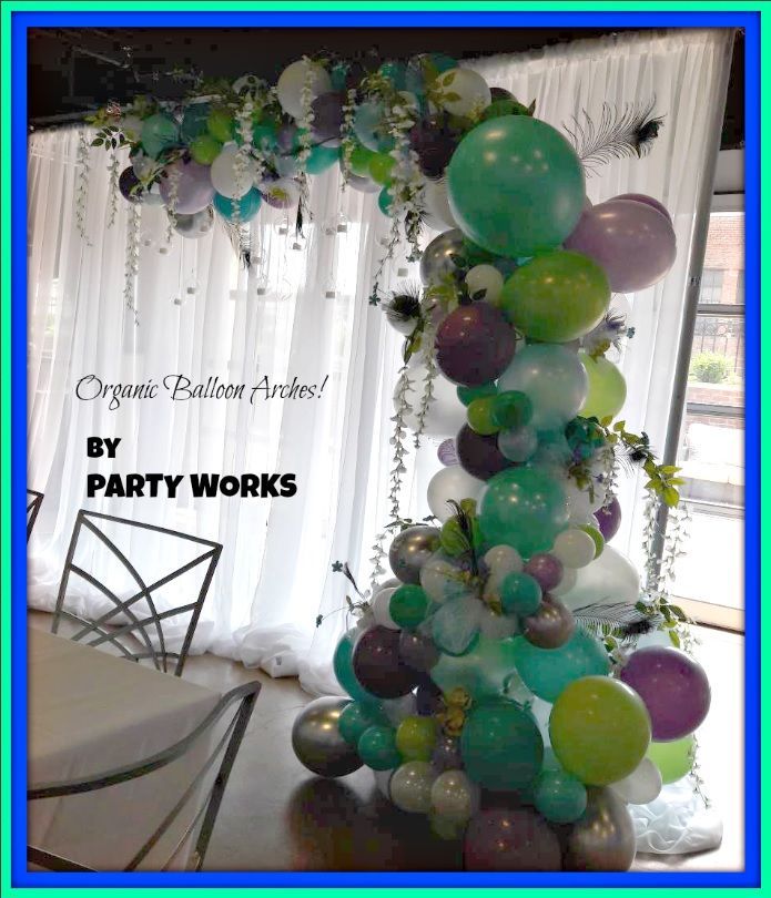 A picture of a balloon arch by party works
