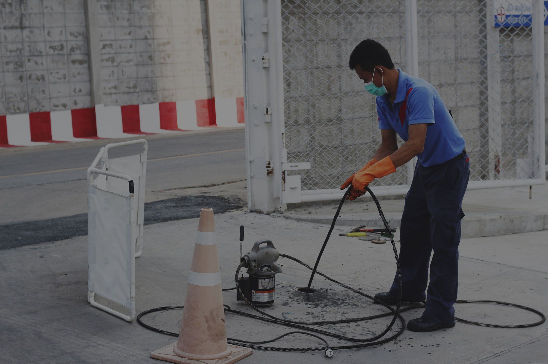 man cleaning sewer