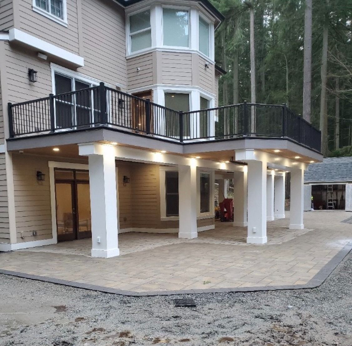 A large house with a balcony and a patio in Monroe, WA