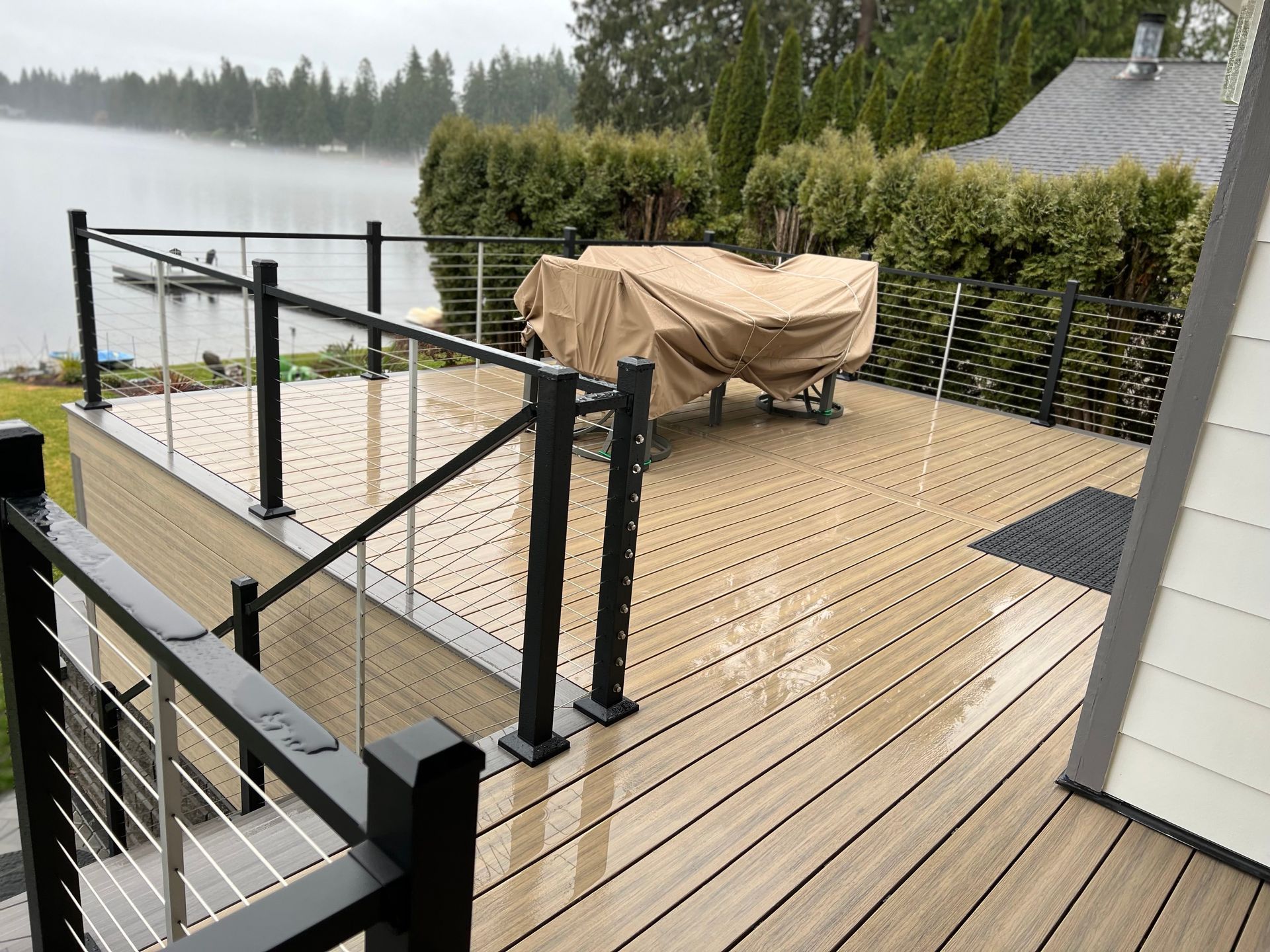 A large house with a balcony and a patio in Monroe, WA.