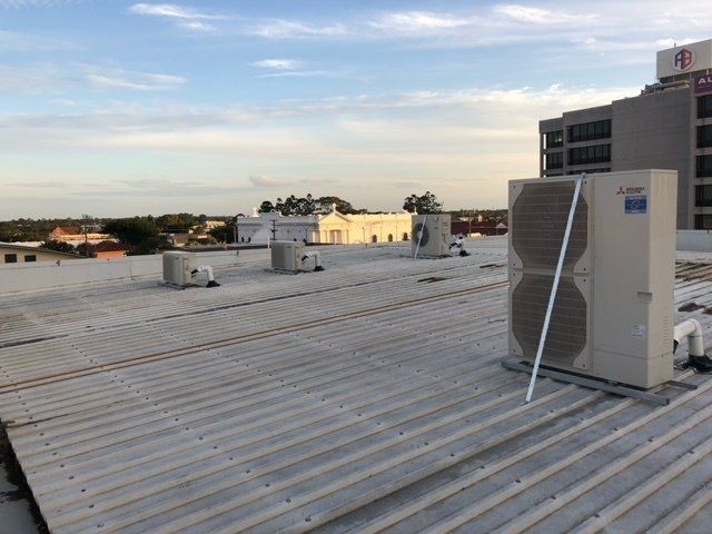 Air Conditioning Unit on Commercial Property Roof - Air Conditioning Services in Mackay, QLD
