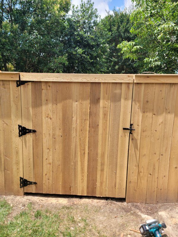 Wooden Fence with a Gate — Virginia Beach, VA — Cardinal Decks