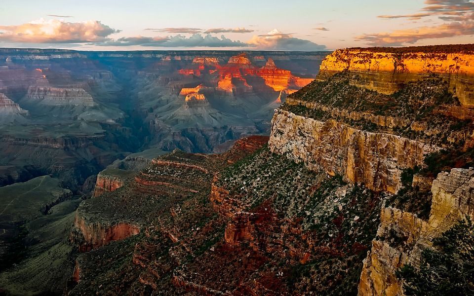 An aerial view of the grand canyon at sunset.