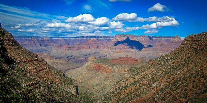 A view of the grand canyon from the top of a mountain.