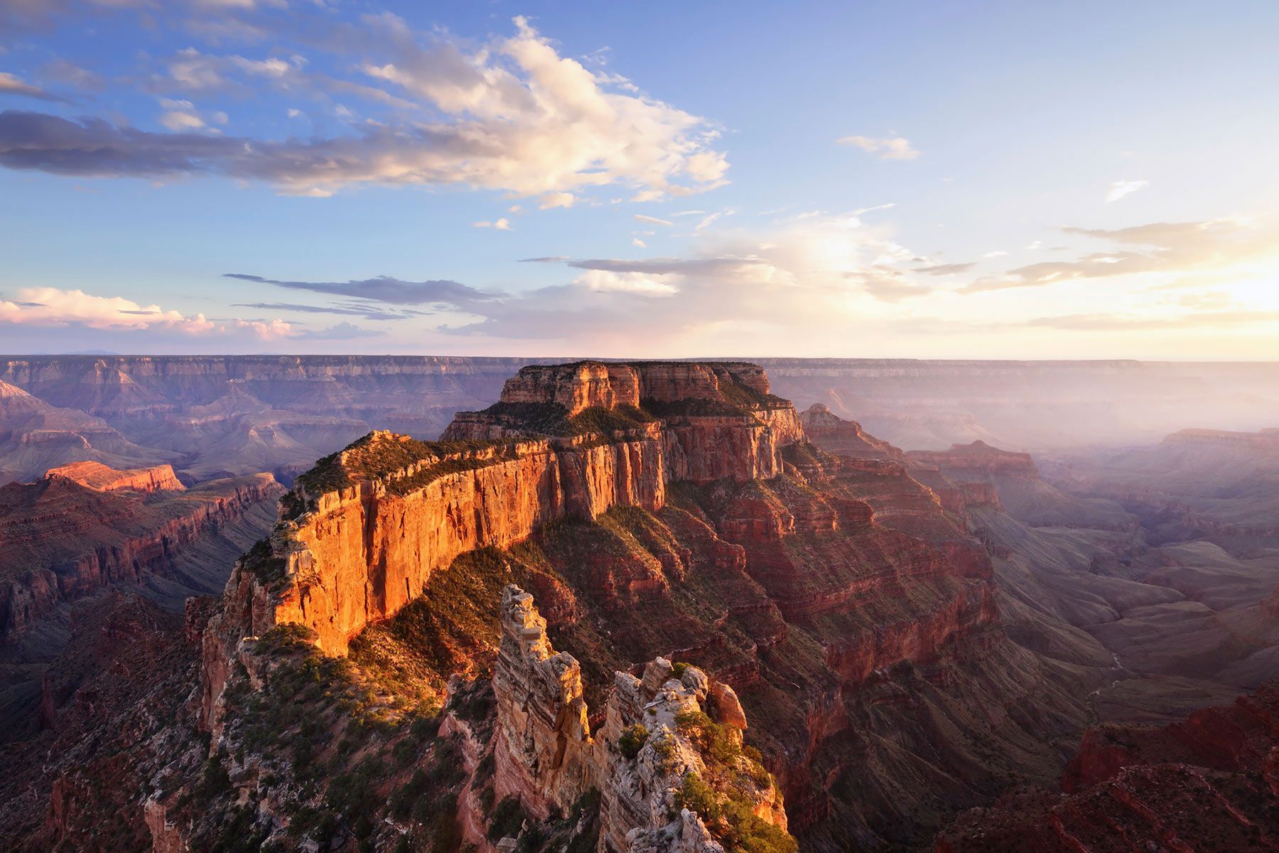 An aerial view of the grand canyon at sunset.