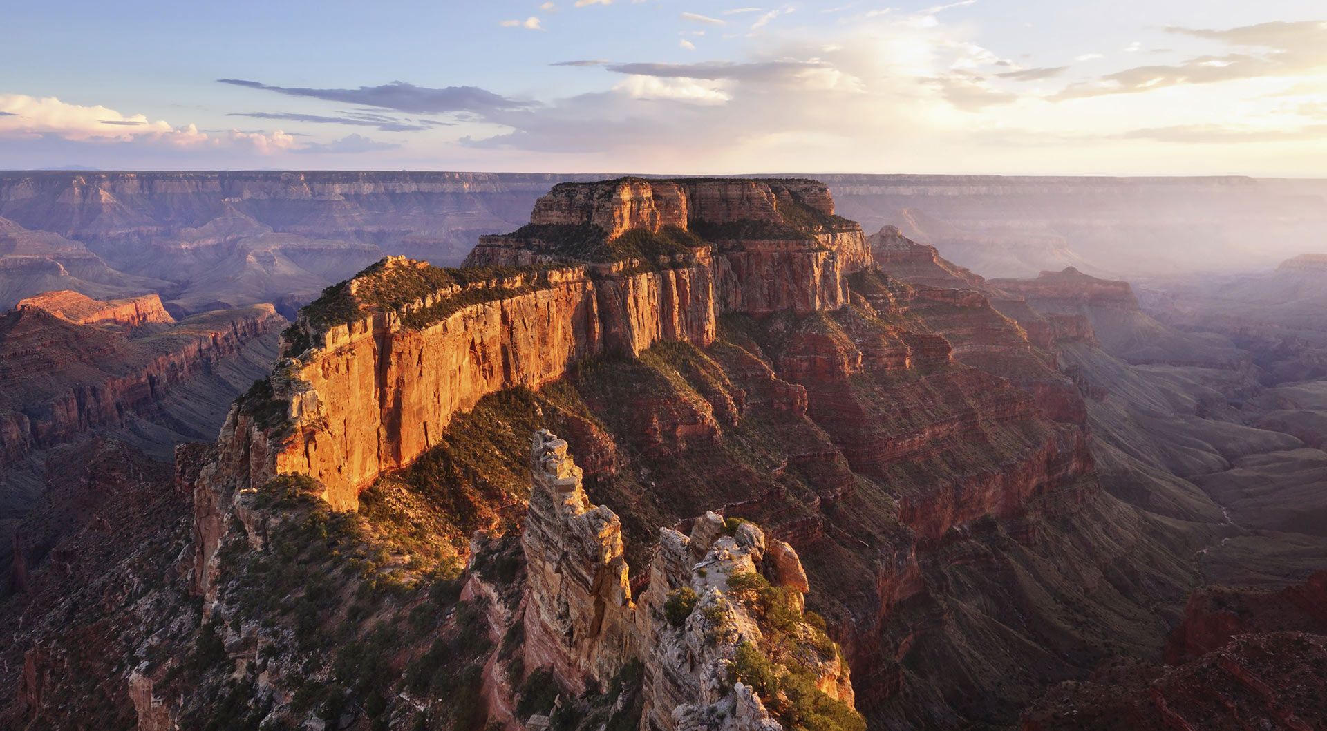 An aerial view of the grand canyon at sunset.