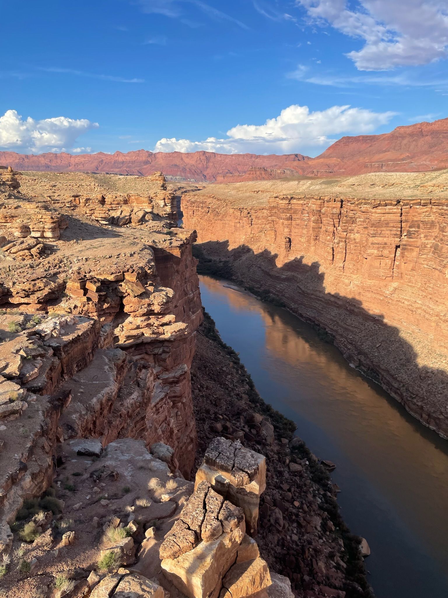 A river running through a canyon surrounded by rocks and mountains.