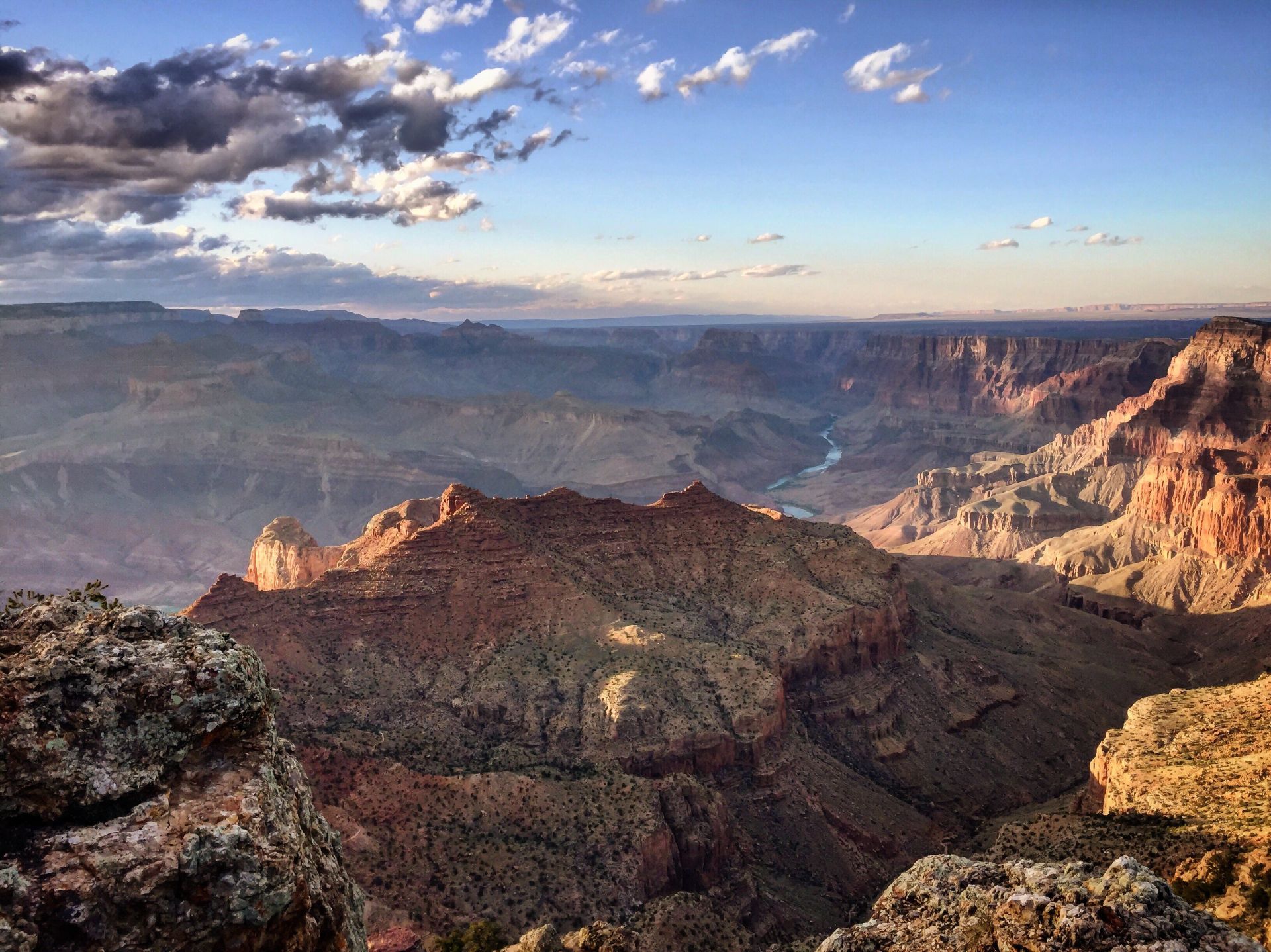 Deep canyon with layered red rock formations