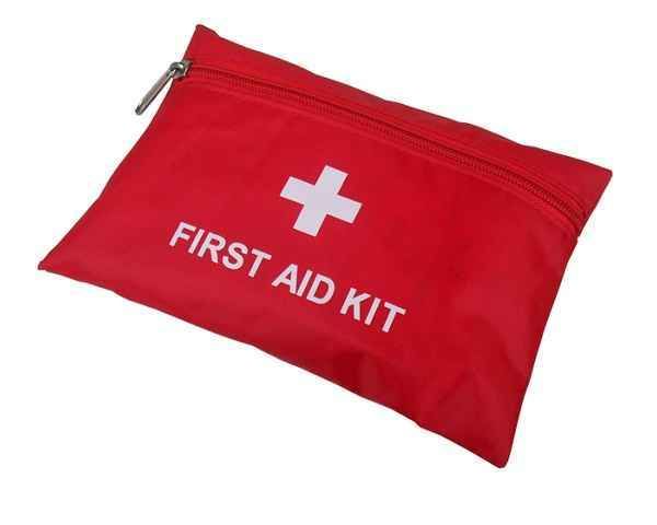 A red first aid kit with a white cross on it.