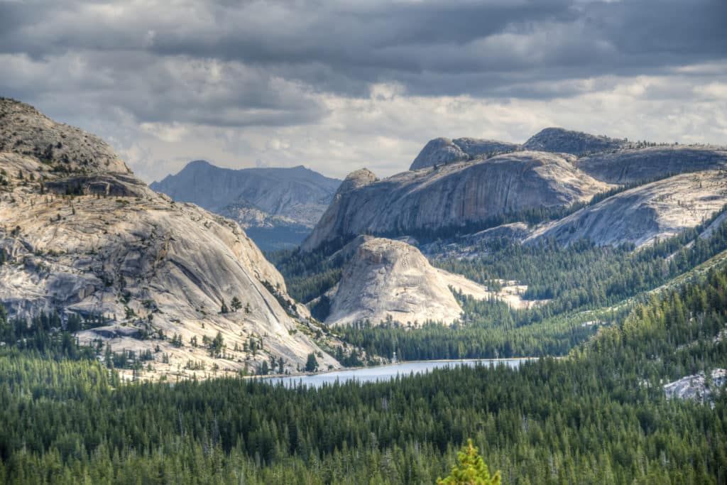 A mountain range with a lake in the middle of it