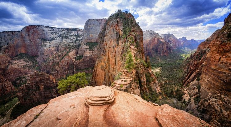 A view of a canyon from the top of a rock formation.