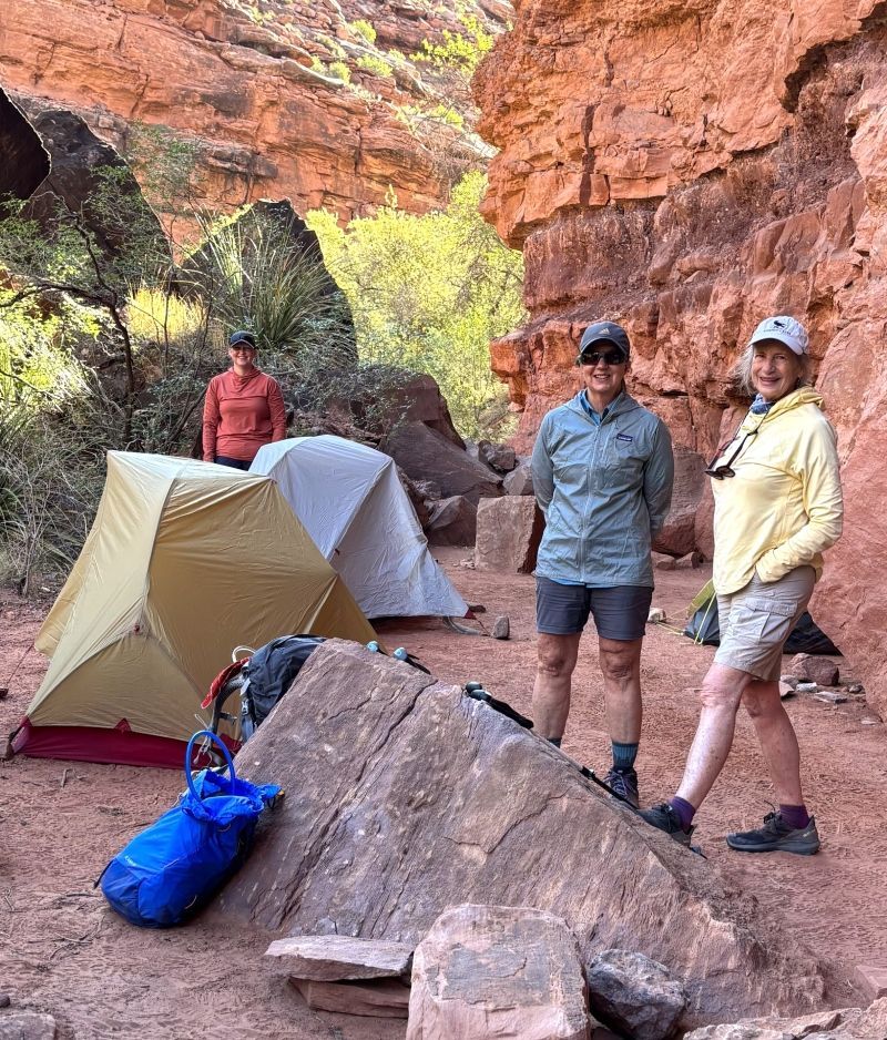 Three woman are enjoying the campsite