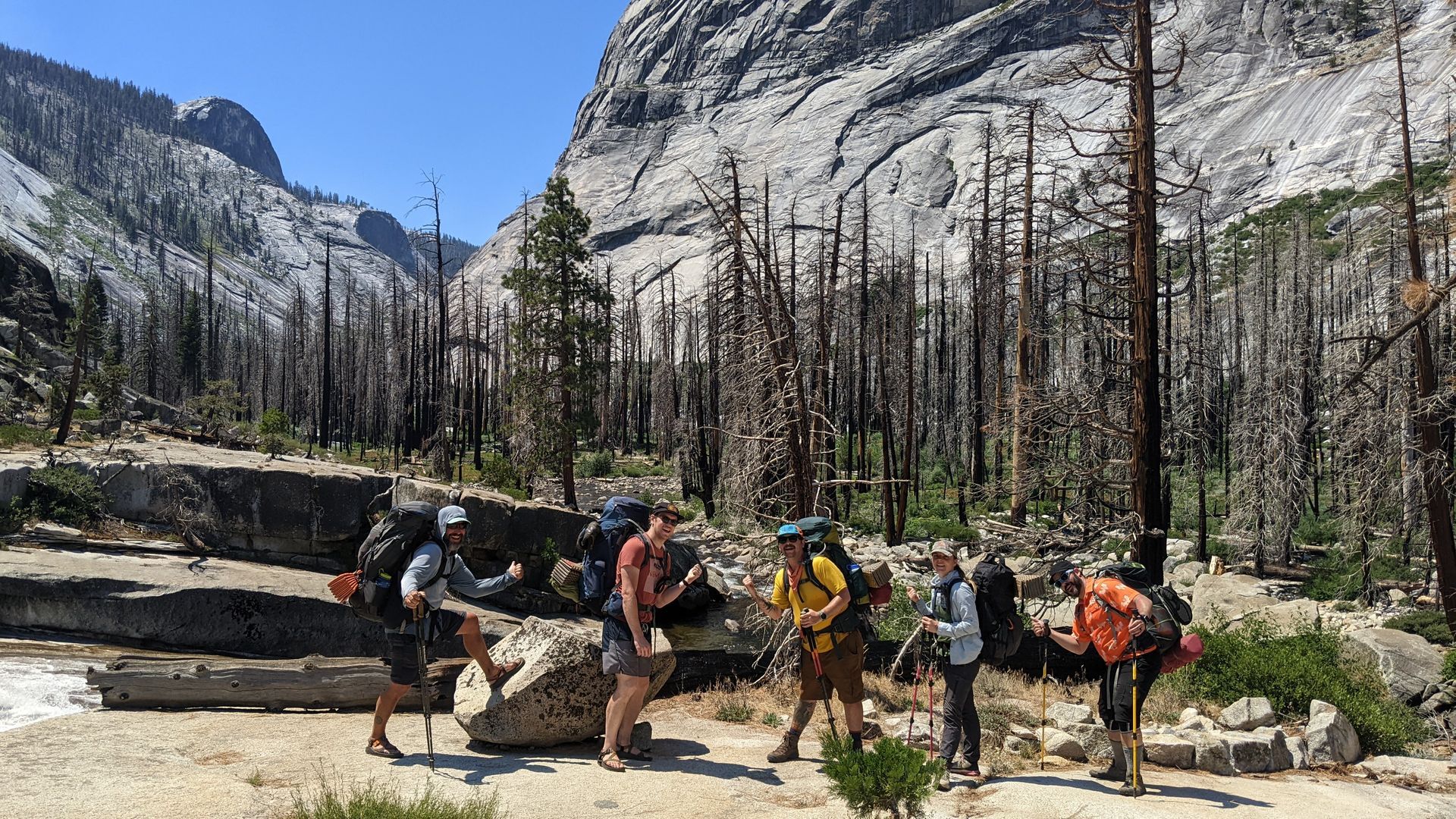 A group of people are hiking in the mountains.