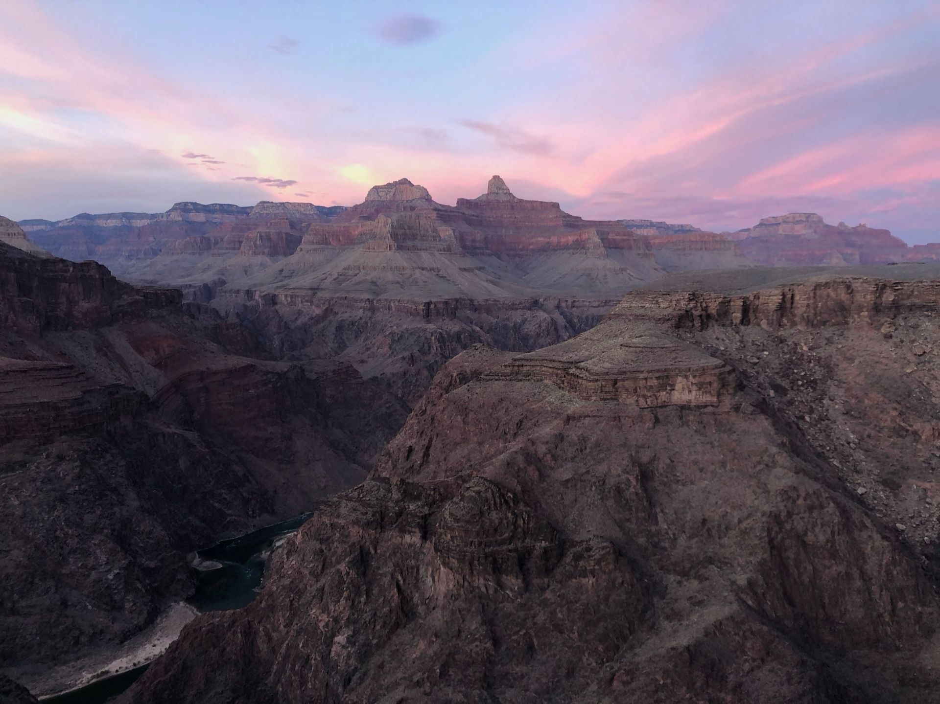 An aerial view of the grand canyon at sunset.